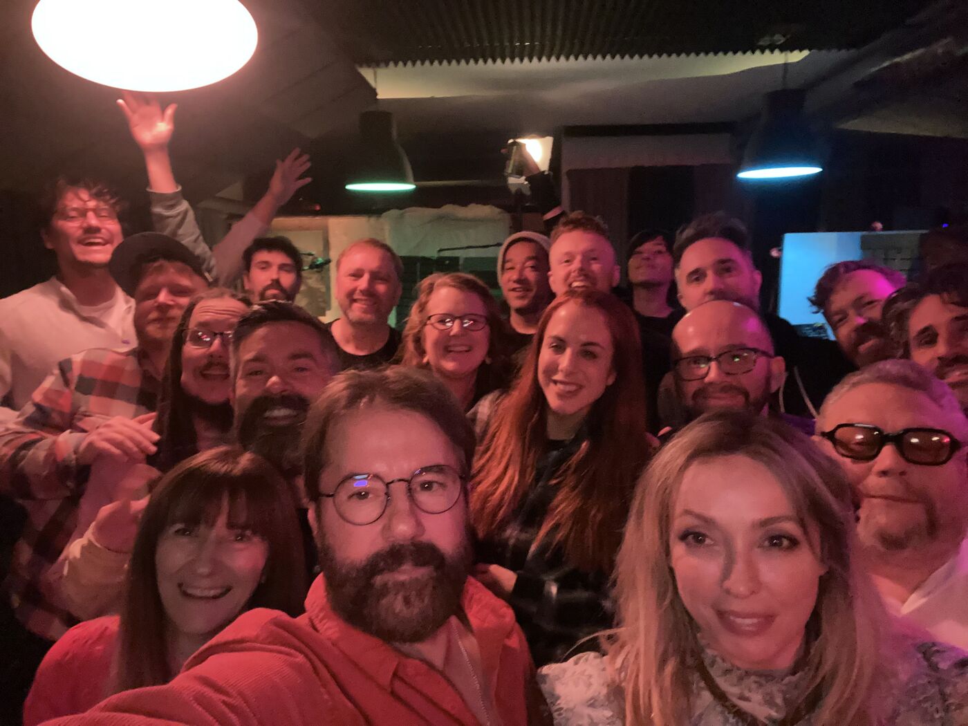 Group selfie with the crew at a wrap party