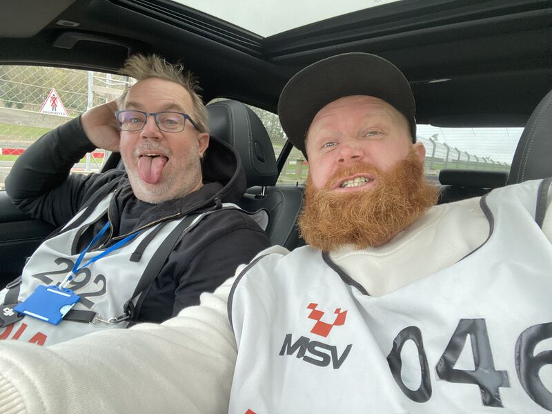 Jack pulling a face in a car on a race track day
