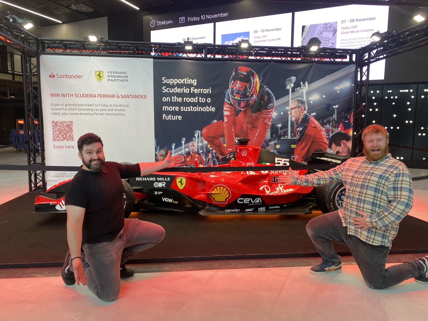 Jack with a Formula 1 car on set